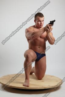 Adam_Ward KNEELING WITH GUN